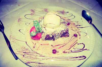 A chocolate brownie with ice cream and a strawberry — Glasgow, Scotland (late July 2000)
