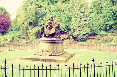 The seated statue of Lord Kelvin in Kelvingrove Park — Glasgow, Scotland (late July 2000)