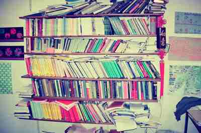 Crammed shelves of a cluttered second-hand bookshop — Glasgow, Scotland (late July 2000)