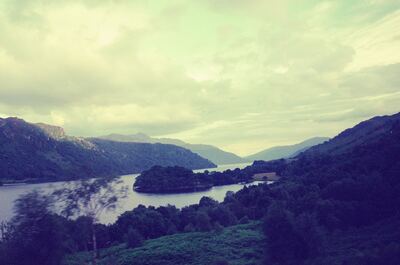A wooded island in a loch on the way to Oban — Oban, Scotland (late July 2000)