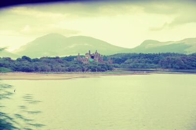 The ruin of Kilchurn Castle beside Loch Awe — Scottish Highlands, Scotland (late July 2000)