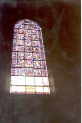 A medieval lancet window glowing in the dark — Chartres, France (4-9 July 2000)